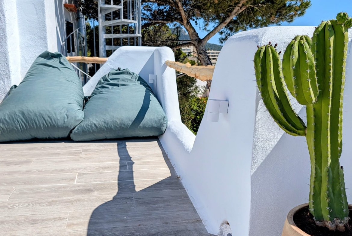 Boho Chic Sea View Apartment with Private Rooftop in Cala Vadella for Summer Rent