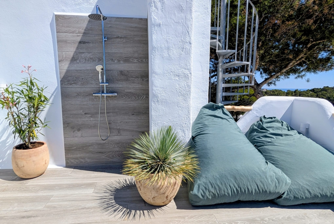 Boho Chic Sea View Apartment with Private Rooftop in Cala Vadella for Summer Rent