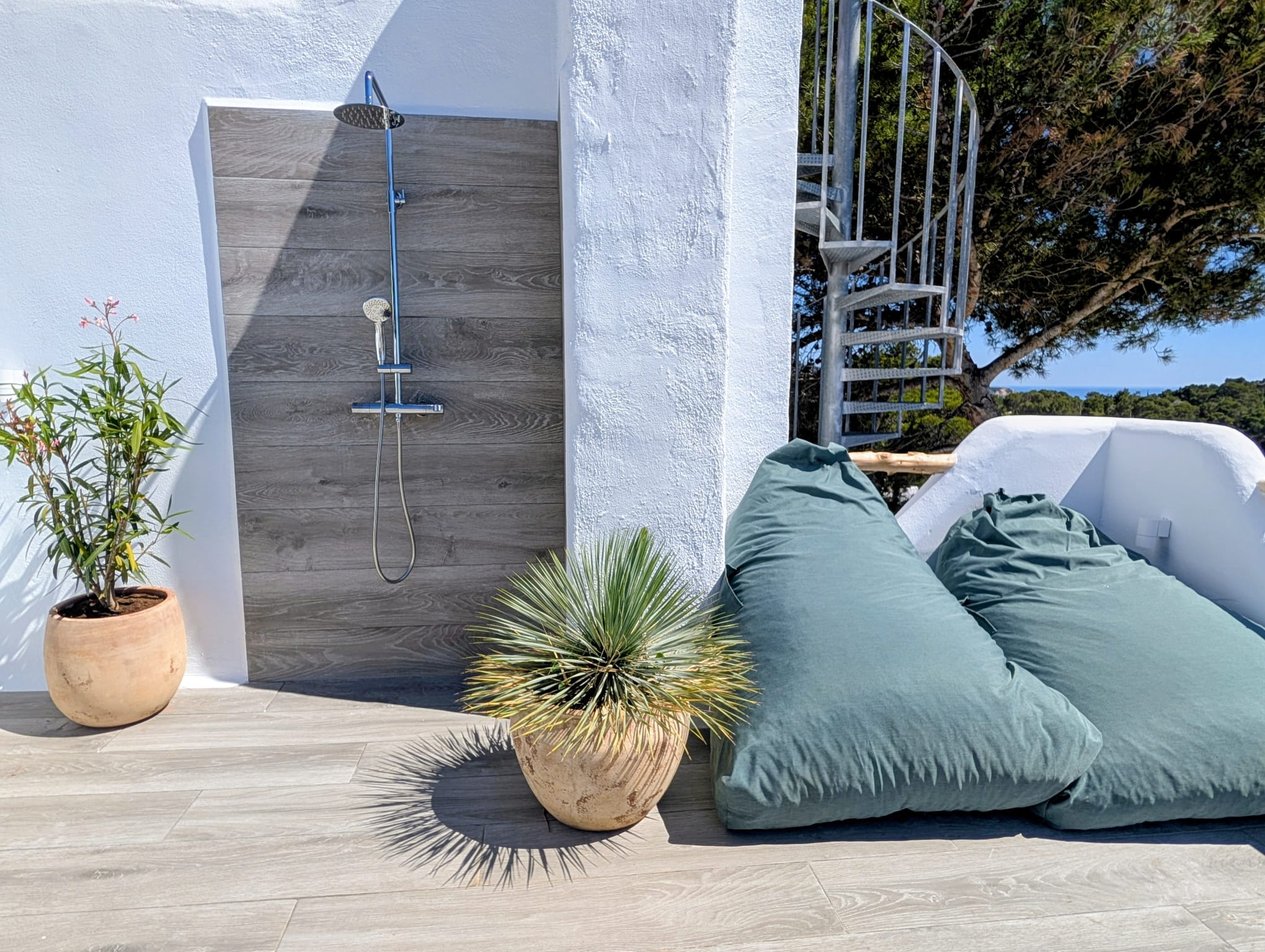 Boho Chic Sea View Apartment with Private Rooftop in Cala Vadella for Summer Rent