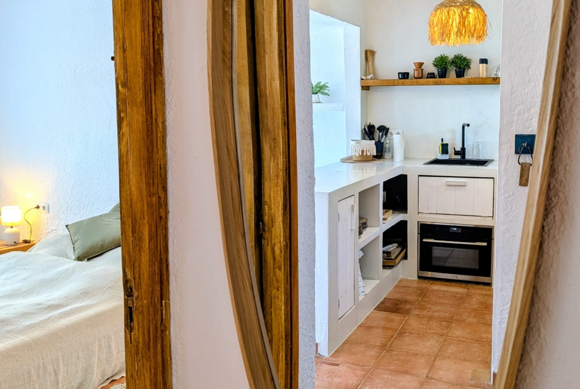 Boho Chic Sea View Apartment with Private Rooftop in Cala Vadella for Summer Rent