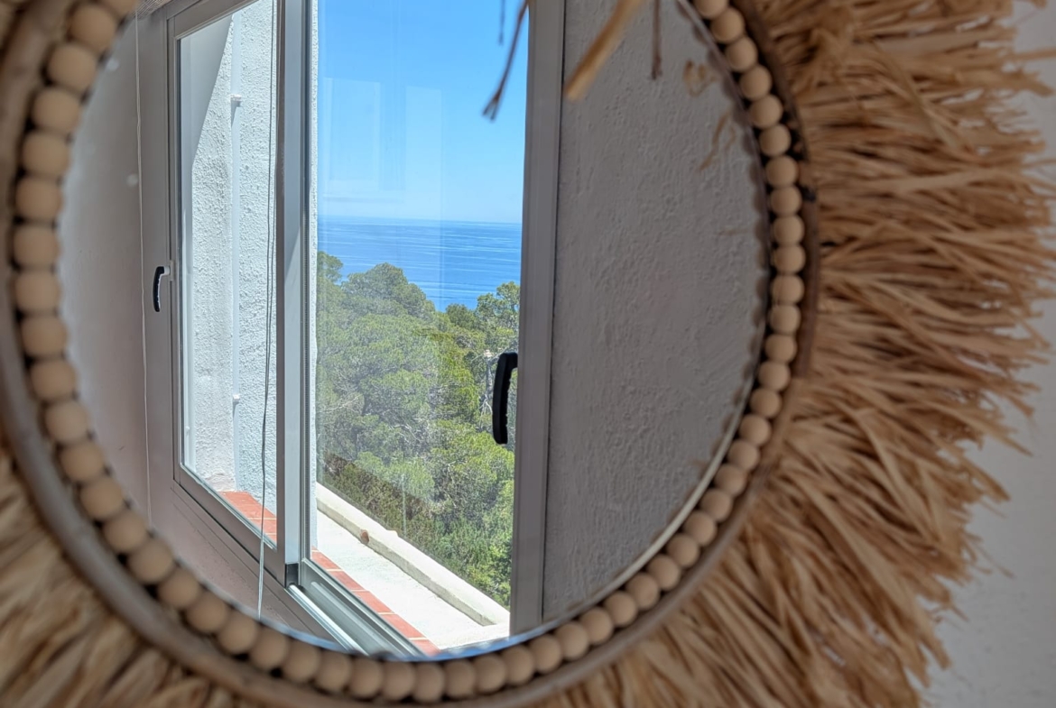 Boho Chic Sea View Apartment with Private Rooftop in Cala Vadella for Summer Rent