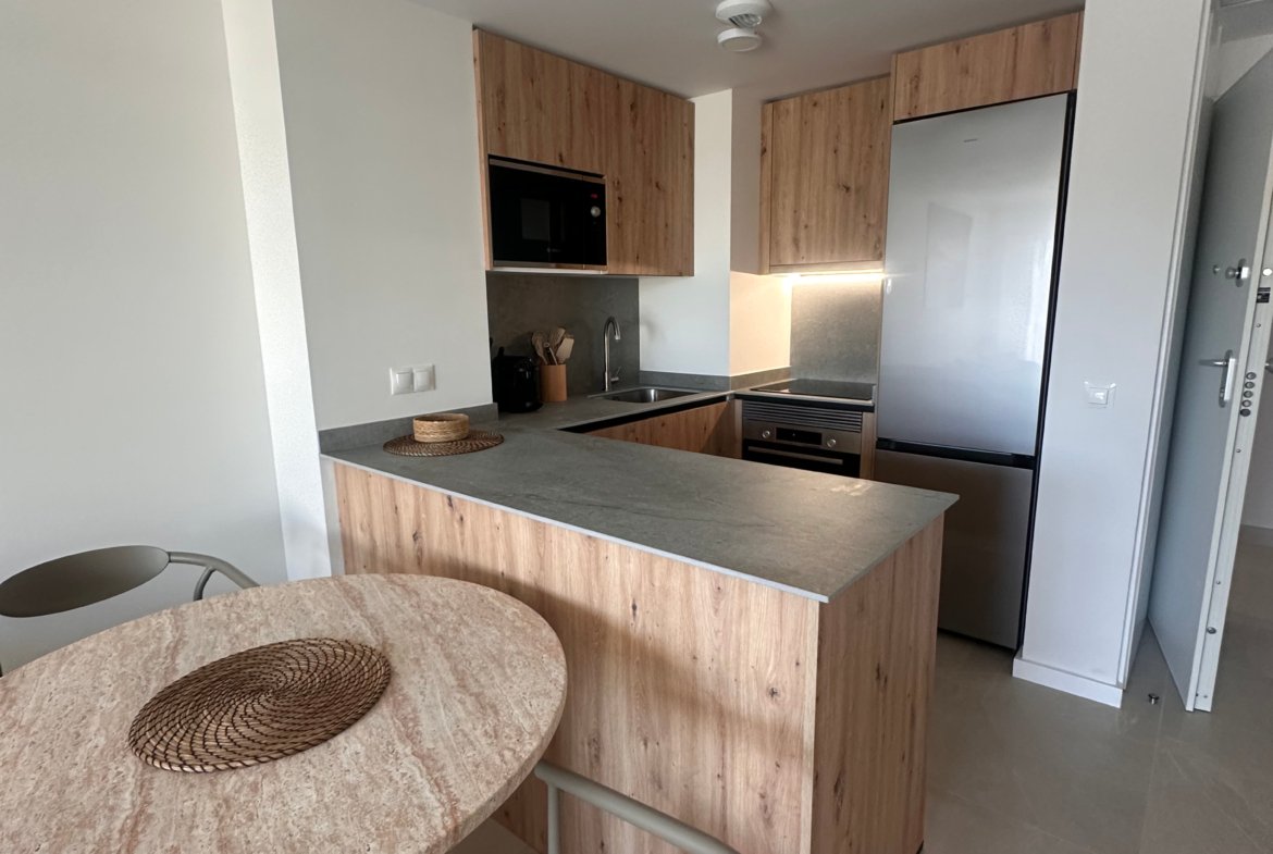 Brand-New 1-Bedroom Apartment with Private Parking and Communal Pool in Playa d’en Bossa