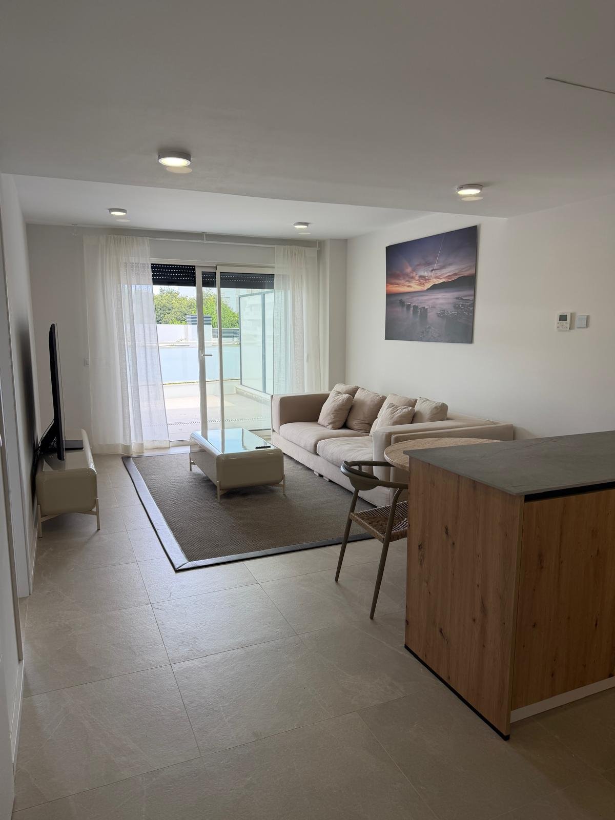 Brand-New 2-Bedroom Apartment with Private Parking and Communal Pool in Playa d’en Bossa