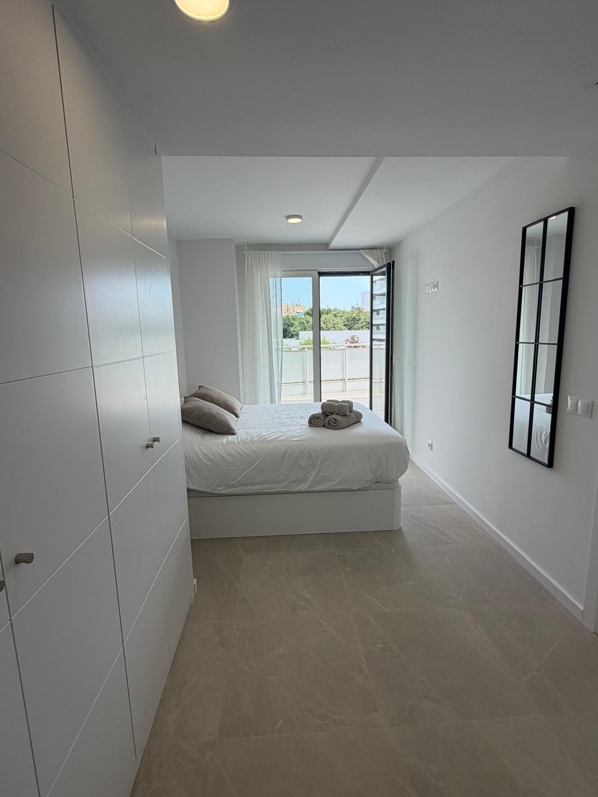 Brand-New 2-Bedroom Apartment with Private Parking and Communal Pool in Playa d’en Bossa